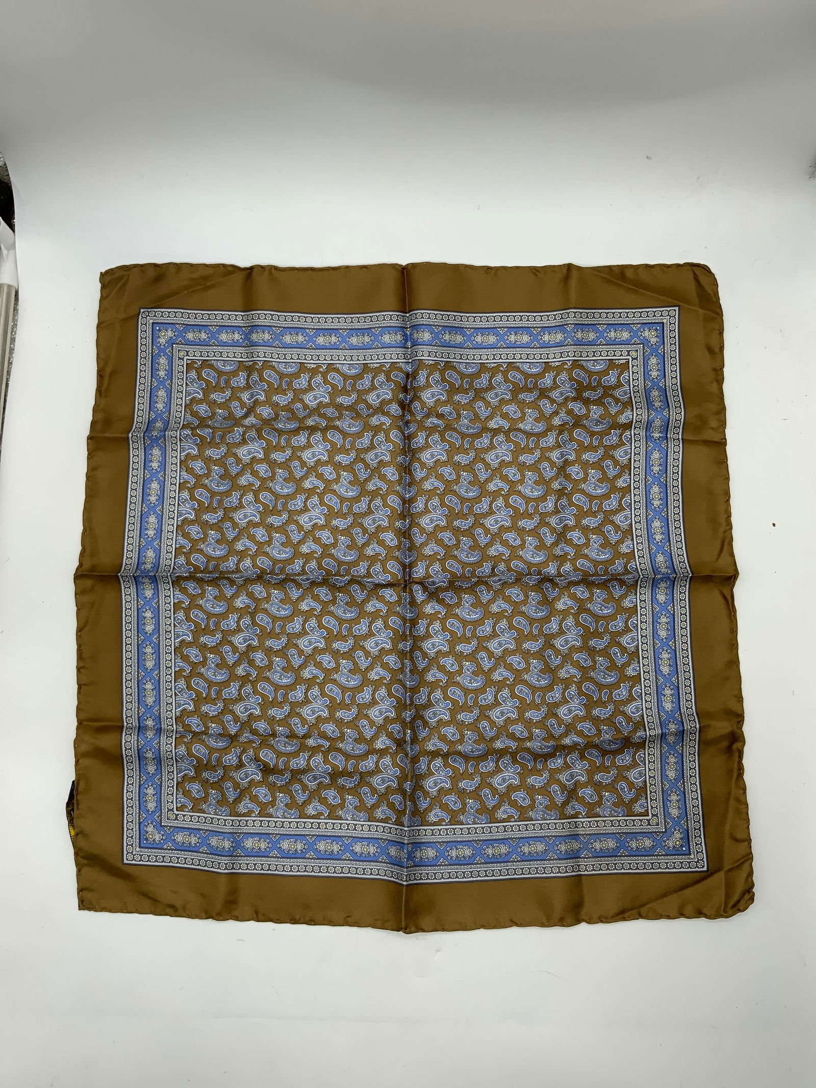 Vtg Pure SULKA Silk Paisley Bandanna Scarf Italy: Vintage pure SULKA silk paisley bandanna scarf. Brown and blue Paisley floral pattern designs. Made in Italy. Hand rolled in Portugal. 19 inches. Some surface wear consistent with exposure. Bandanna,