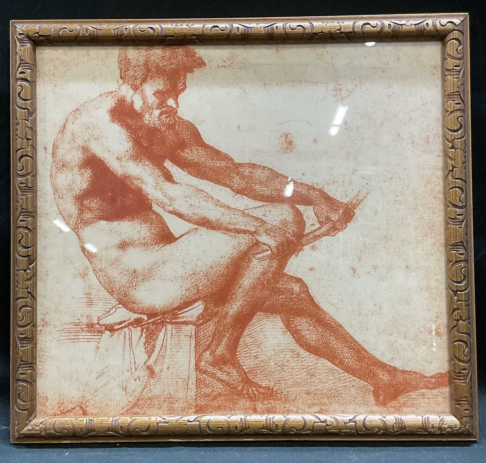 Framed Classical Nude Male Fine Art Print: Framed fine art print on paper. Classical style figure study. Seated nude male figure. Gilt wood framed not examined out of frame. Frame measures approx 12 x 13 inches. Some creasing to paper. Art, fi