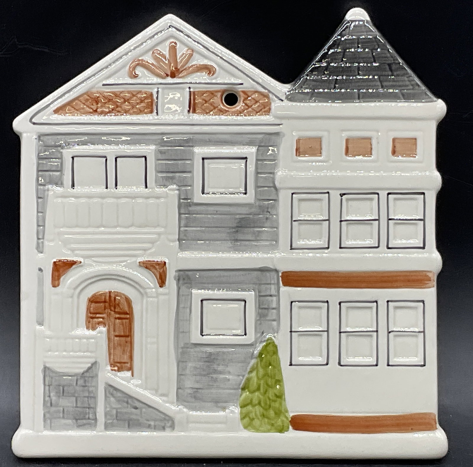 OTAGIRI 1983 Handcrafted Ceramic House Trivet: OTAGIRI 1983 Handcrafted Ceramic House Motif Trivet. Sticker reads Handcrafted OTAGIRI and the reverse reads OTAGIRI 1983. Residue, discoloration, surface wear, and chipping present. Measures approx.