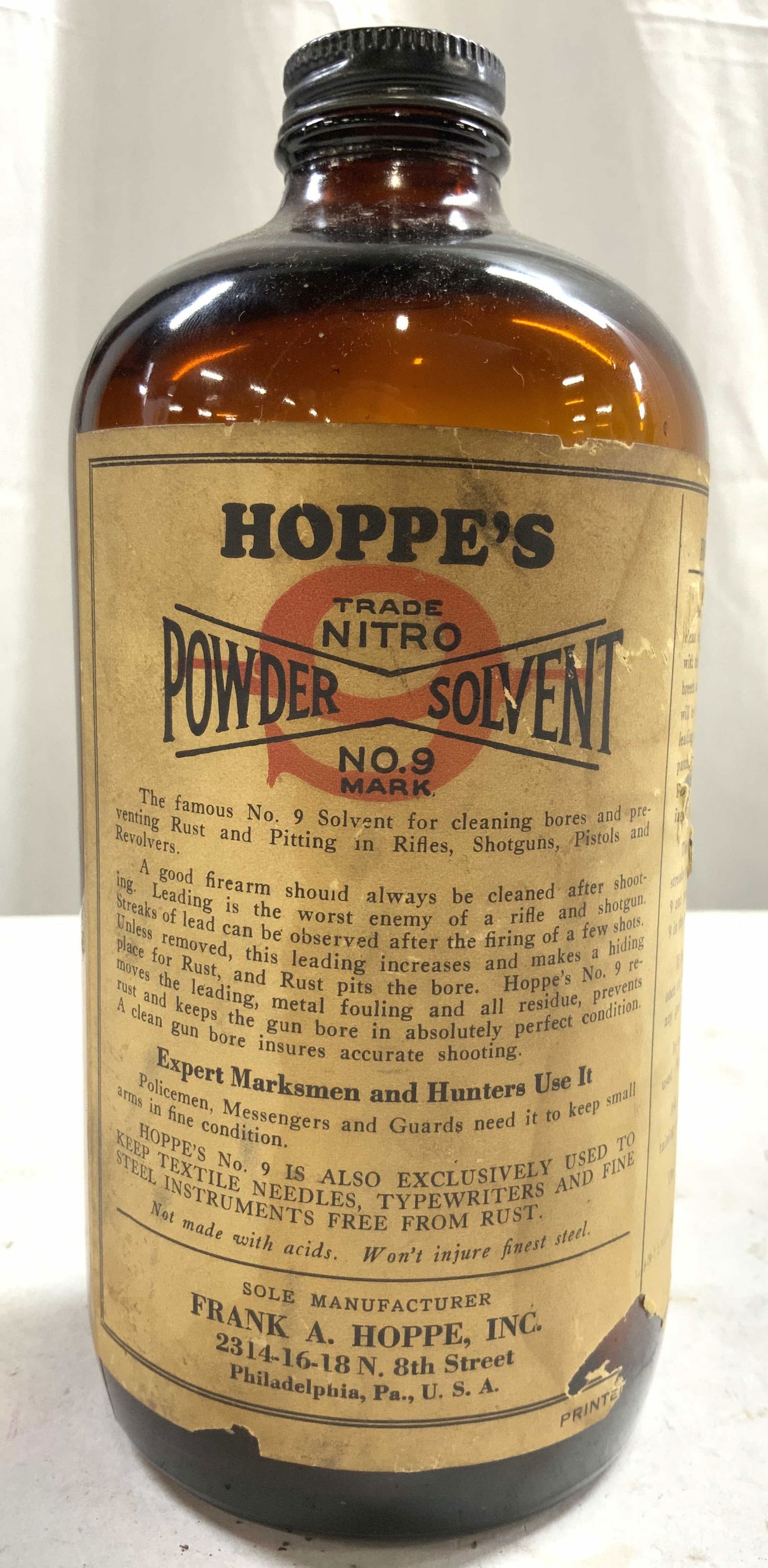 HOPPES 9 Vtg Powder Solvent Bottle: Tag reads HOPPES 9 POWDER SOLVENT. Bottle is glass, Piece has an amber tone. Bottle has a black toned metal cap. Underside hall ARKE I in a diamond and oval. Piece is vintage. Bottle measures approxim
