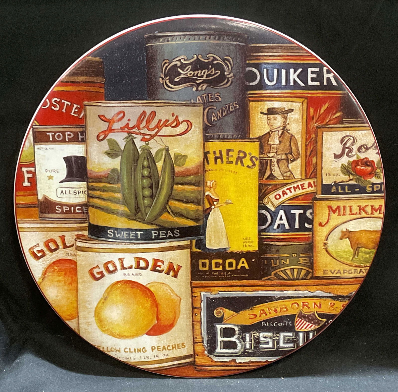 Sakura Homestead Pantry Porcelain Trivet Plate: Sakura Homestead Pantry porcelain trivet plate designed by David Carter Brown. Signed. Measures approx 9.5 inches wide. Piece has weight. Some scratching. Sakura trivet, Sakura plate, porcelain trivet