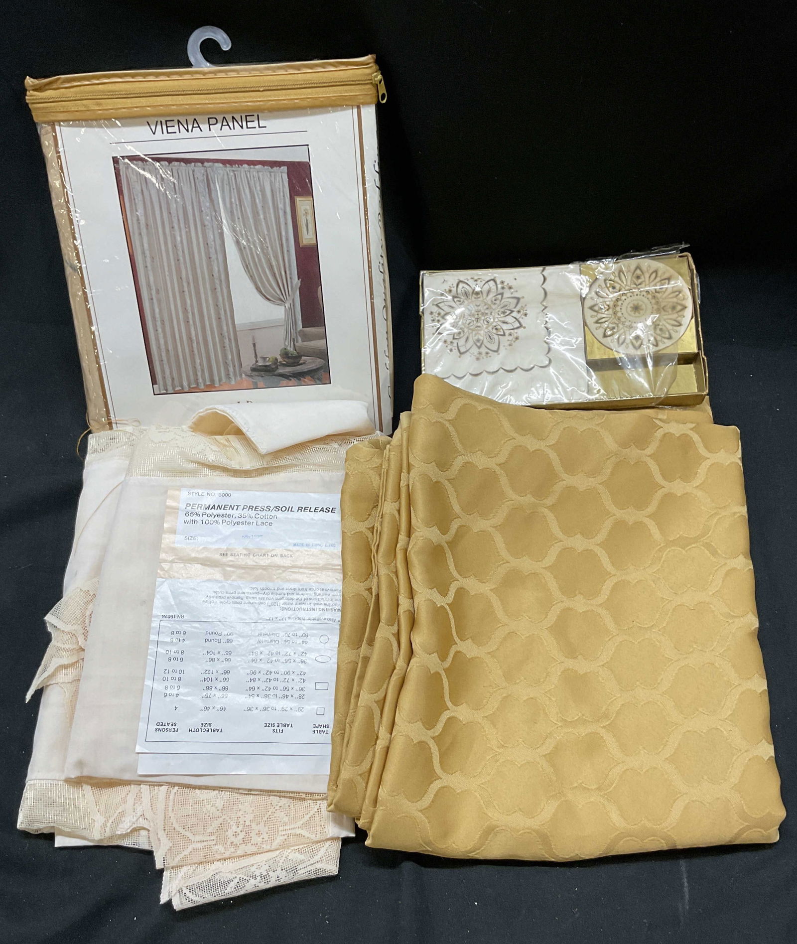 Lot 27 Vtg Golden Polyester Viena Panel Tablecloth: Lot 27 vintage Golden linen Viena panel, tablecloths, napkins. Lot includes Scents Petite Ensemble 12 Luncheon beverage napkins and 12 coasters, 1 army and navy tablecloth, 1 Golden Quality Bedding Or