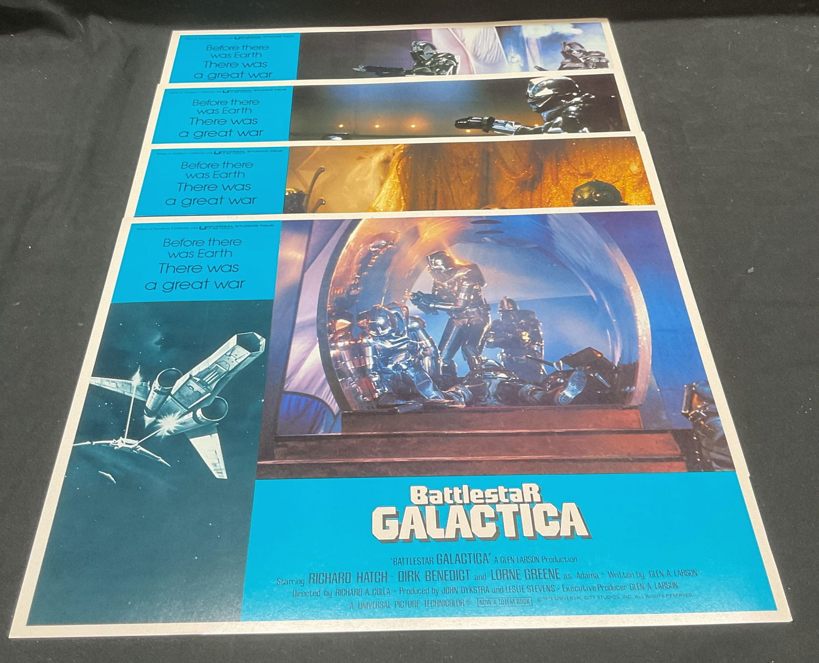 Lot 4 Battlestar Galactica Lobby Card Posters 1979: Lot of 4 1979 Battlestar Galactica lobby card posters. Starring Dirk Benedict, Richard Hatch, Lorne Greene. Directed by Richard A Colla. Measures approx 11 x 14 inches. Some wear to all consistent wit