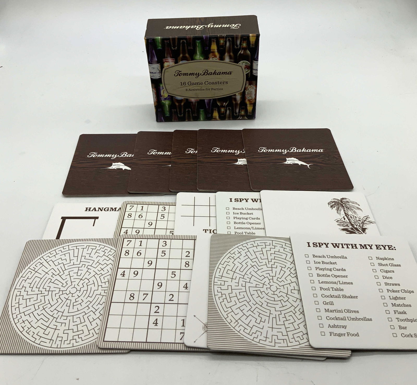 Tommy Bahama 15 Game Coasters Set W Box: 15 game coasters that contain mazes, tic-tac-toe, sudoku, connect the dots, & hangman games. Coasters come in original box. Surface wear consistent to age, use & exposure. Measurements: length 3.7in x