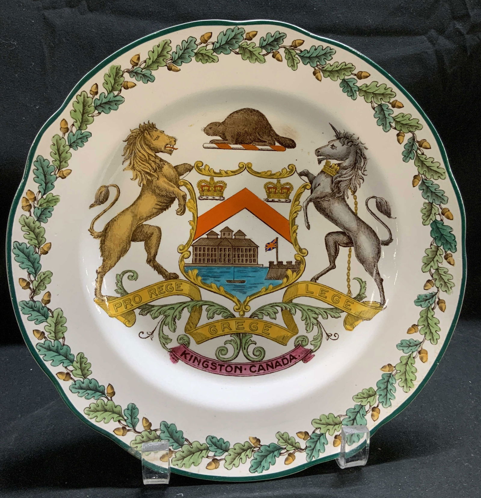 Vntg Wedgwood Coat of Arms Plate ENGLAND: Ceramic plates feature a central design depicting the Coat of Arms of Kingston, complete with a beaver crest, lion & unicorn figures. Plate reads, PRO REGE LEGE GREGEM KINGSTON CANADA. Signed & marked