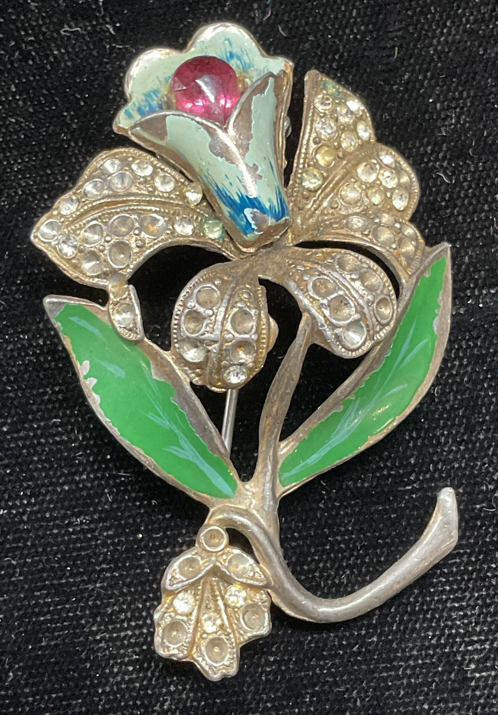 Vintage BM Silver Tone Crystal Flower Brooch: Vintage signed flower motif brooch. Silver tone with enamel and crystal decoration. Signed BM. Measures approx 2.25 x 1.5 inches. Some loss to enamel and crystals. Jewelry, estate jewelry, costume jew