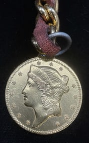 Gold Tone Coin Motif Pendant Necklace