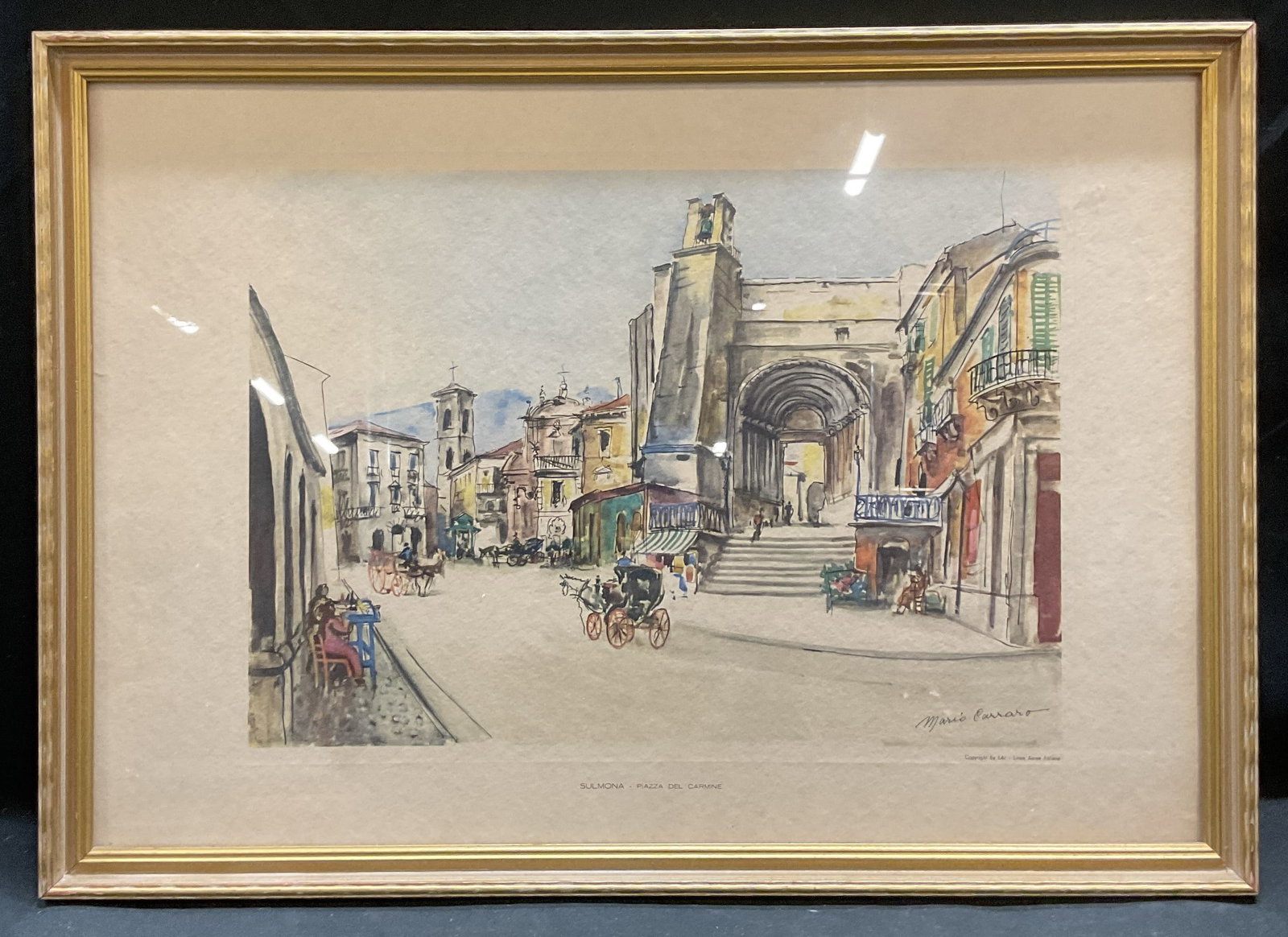 Mario Carraro Sulmona Italian Scenery Lithograph: Framed lithograph on paper. Signature in print, Mario Carraro (Italian, 1896 - 1978). Mario Carraro is a listed artist known for landscape paintings. Sulmona, Piazza Del Carmine. Italian street scene.