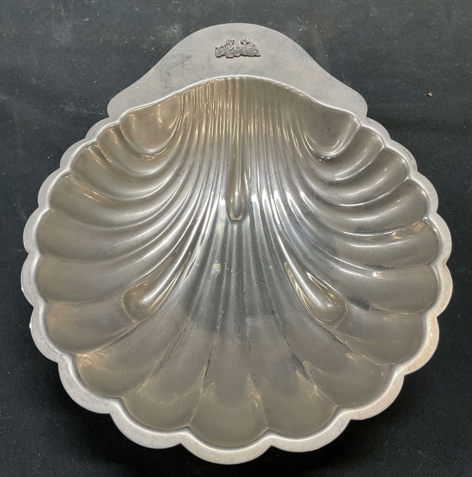 Vtg Tebco Platinum Finish Figural Shell Dish: Vintage Tebco platinum finish shell dish with raised tribal figural motif. Signed. Measures approx 8.25 x 6.75 x 1.5 inches. Some scratching and patina. Tebco shell dish, platinum finish shell dish, s