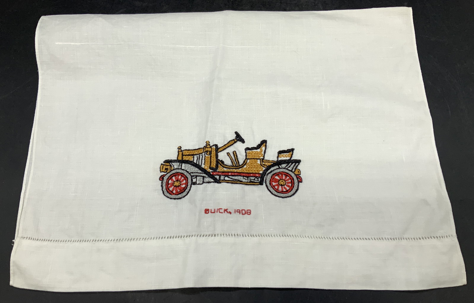 Vntg Linen Embroidered 1908 Buick Car Hand Towel: Vntg Linen Embroidered 1908 Buick Car Hand Towel Hand towel appears to be linen material & features an embroidered Buick 1908 classic car. Surface wear consistent to age, use & exposure. Measurements: