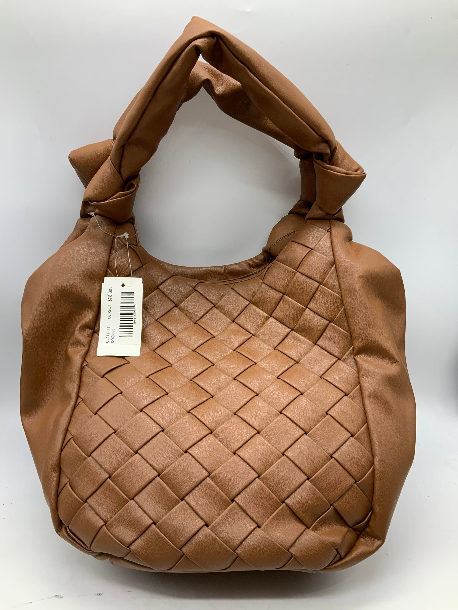 Brown Woven Faux Leather Handbag NWT: Brown Woven Faux Leather Handbag NWT Brown faux leather handbag featuring a woven panel/pattern. Bag features interior pockets. New with tags. Surface wear consistent to age, use & exposure. Measureme