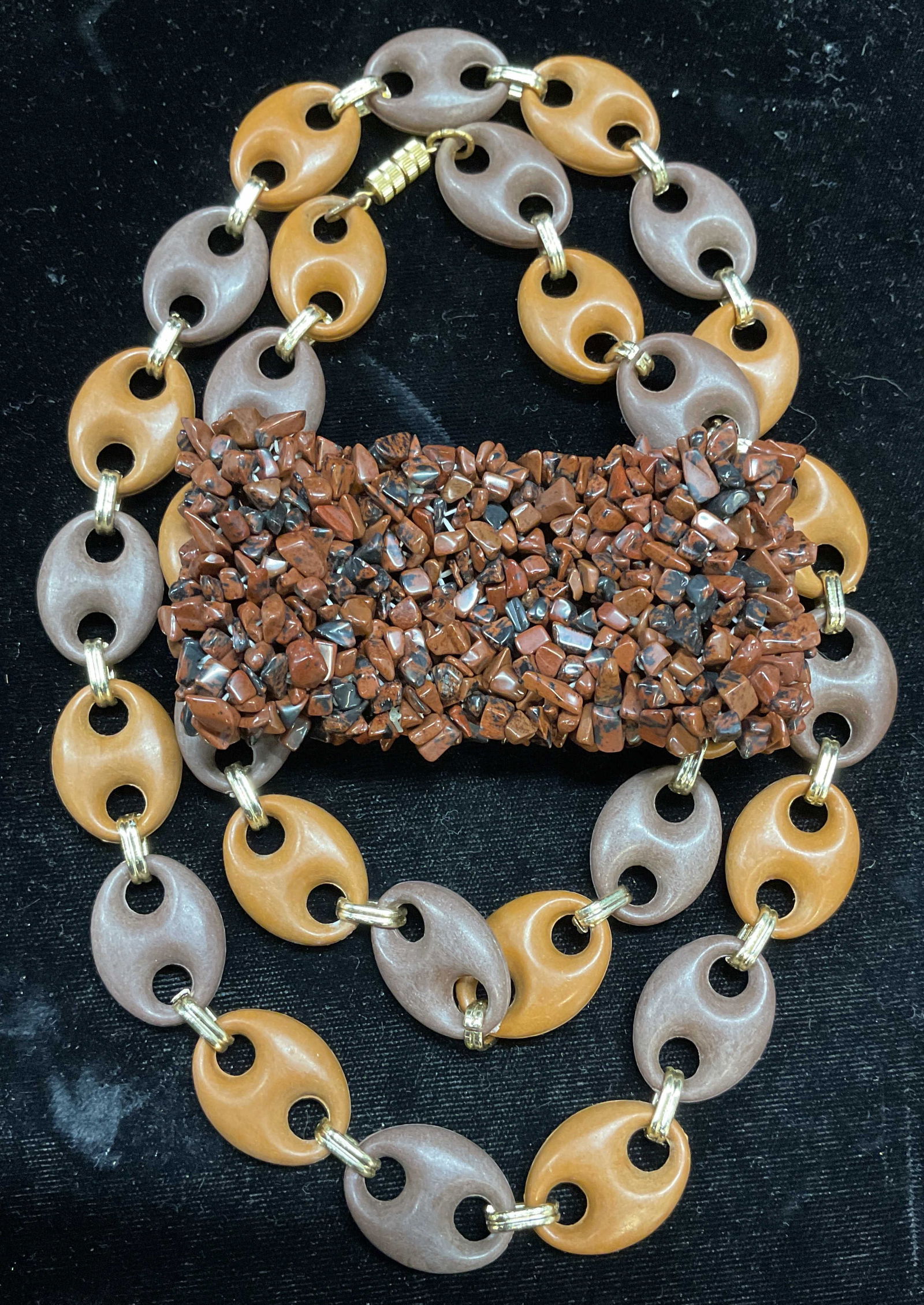 Lot 2 Jewelry Brown Semiprecious Stone Bracelet +: Lot of 2 pieces. Stretch wide band brown toned semiprecious stone chip beaded bracelet. Measures approx 2.25 inches wide. Brown toned composite beaded necklace with gold tone connectors. Drop length a