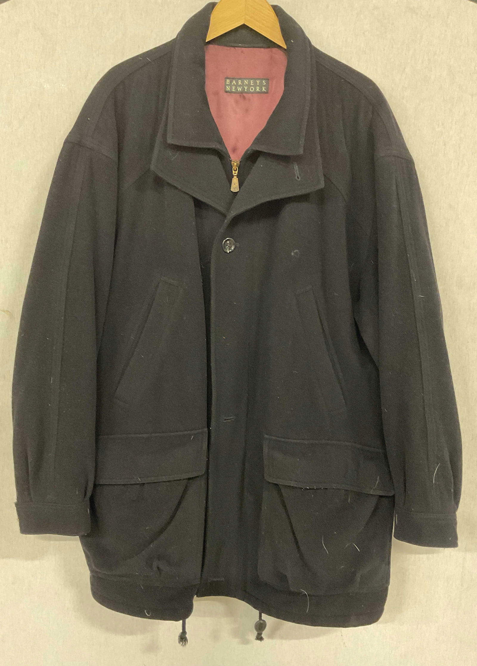 Barneys New York Black Wool Coat: Barneys New York black wool coat. Fully lined. Measures approx 24 inches across chest. Some blemishes, one button needs replacement. Barneys coat, wool coat, designer coat, black coat, outerwear, mens