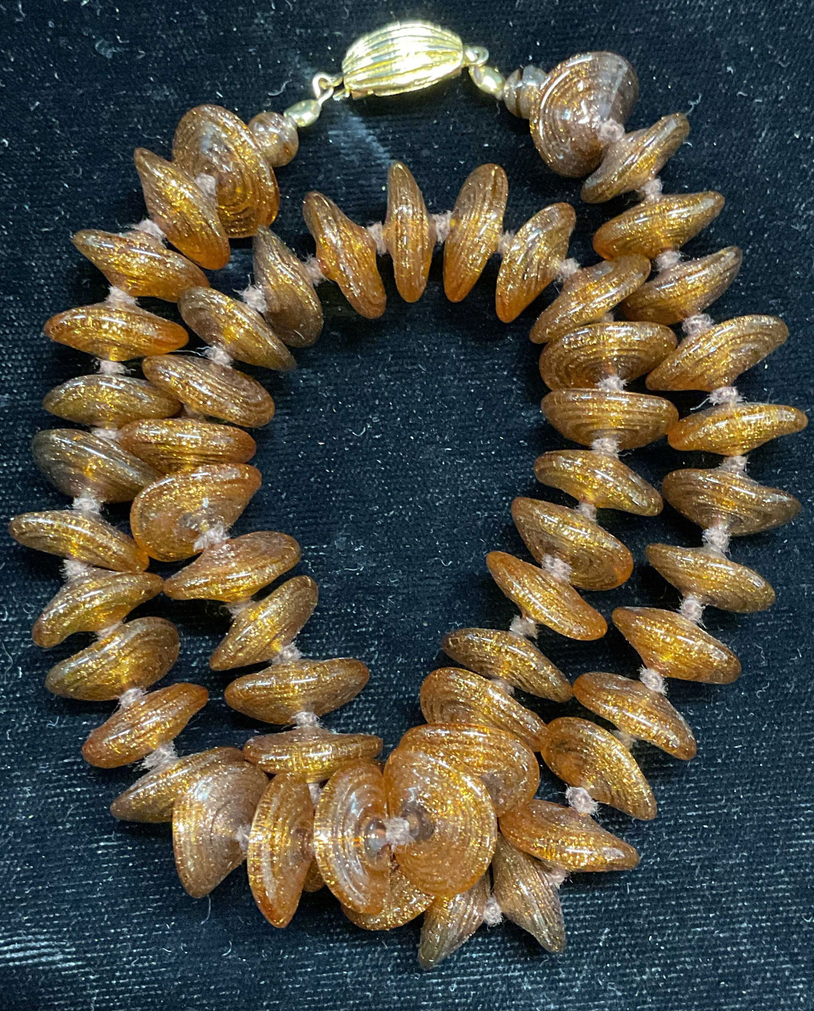 Vintage Gold Fleck Art Glass Beaded Necklace: Vintage gold fleck art glass disc bead necklace. Drop length approx 8.5 inches. Some wear including scratching. Jewelry, estate jewelry, costume jewelry, cocktail jewelry, fashion jewelry, accessories