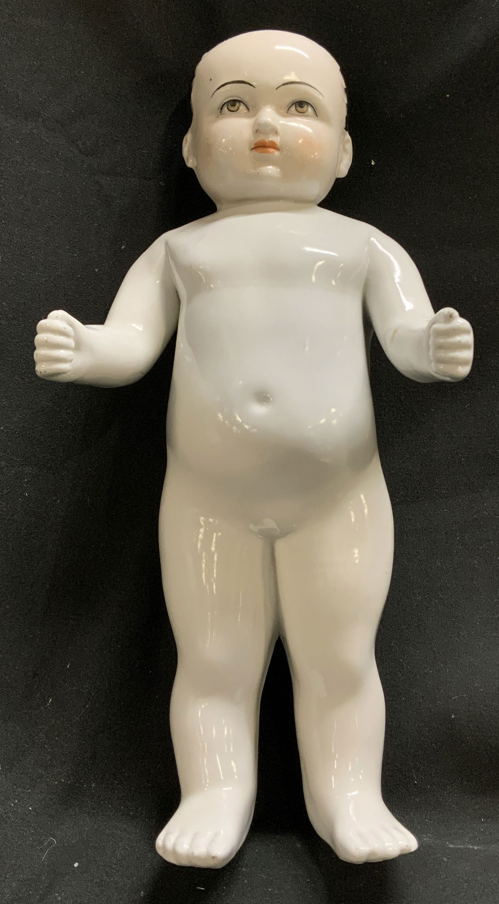 Antq Bisque Frozen Charlie Charlotte Doll 12in: Antq Bisque Frozen Charlie Charlotte Doll Antique possible vintage. Doll features a glossy white porcelain body with hand-painted details on the face, including hair, eyes, and mouth. Surface wear con