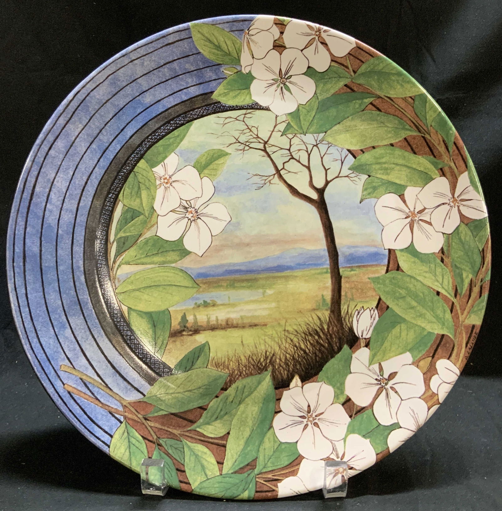 Gien Evasion Scenic Round Serving Plate FRANCE: Gien Evasion Scenic Round Serving Plate FRANCE Plate features a vibrant & nature/scenic design with a central landscape scene surrounded by a floral border. The plates outer rim on the left side featu