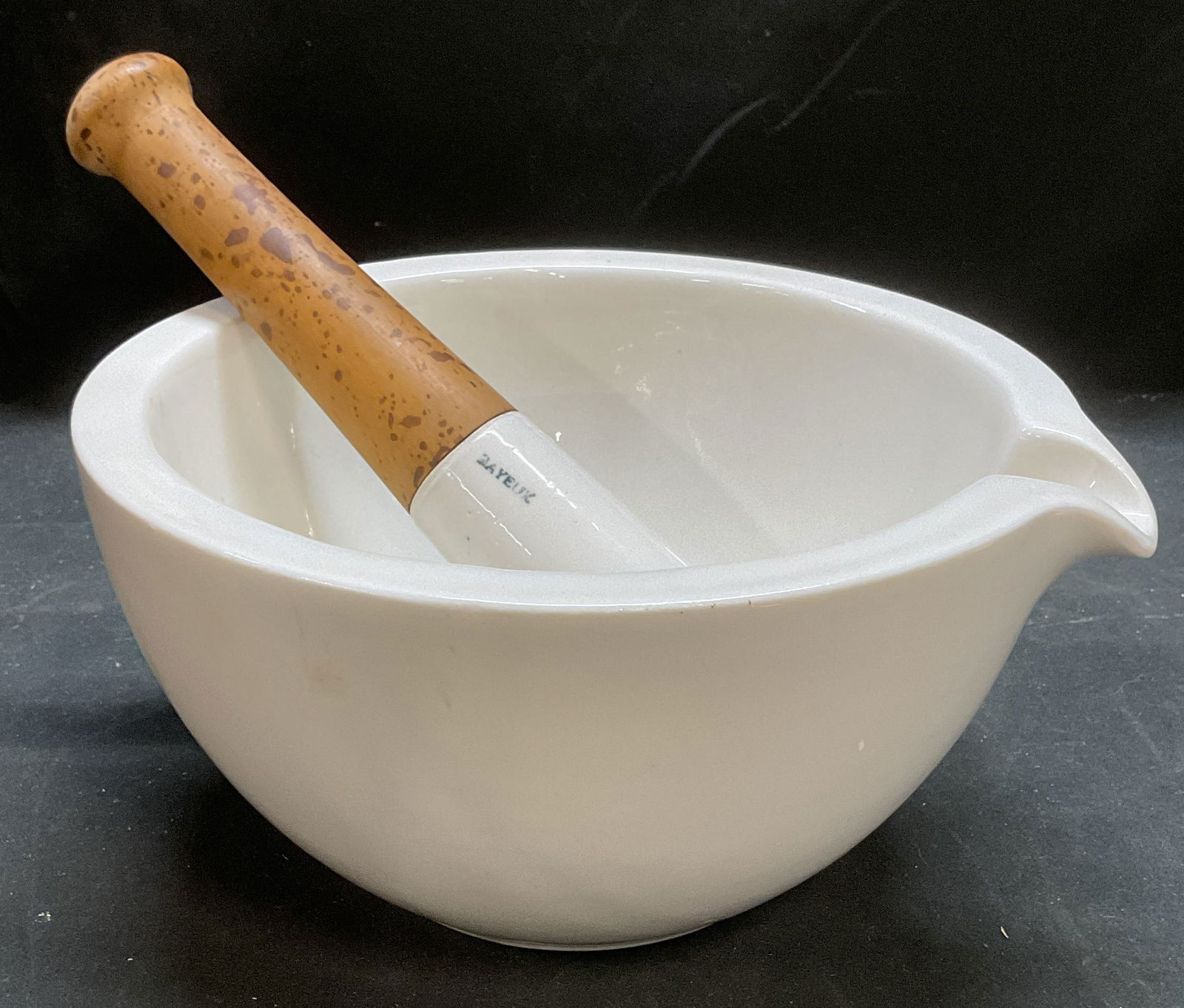BAYEUX France Ceramic Mixing Bowl & Pestle: Vintage BAYEUX France white ceramic mixing bowl and pestle. Bowl marked France on underside and illegibly below spout, appears to read BAYEUX, pestle marked BAYEUX. Thick walled ceramic bowl in white