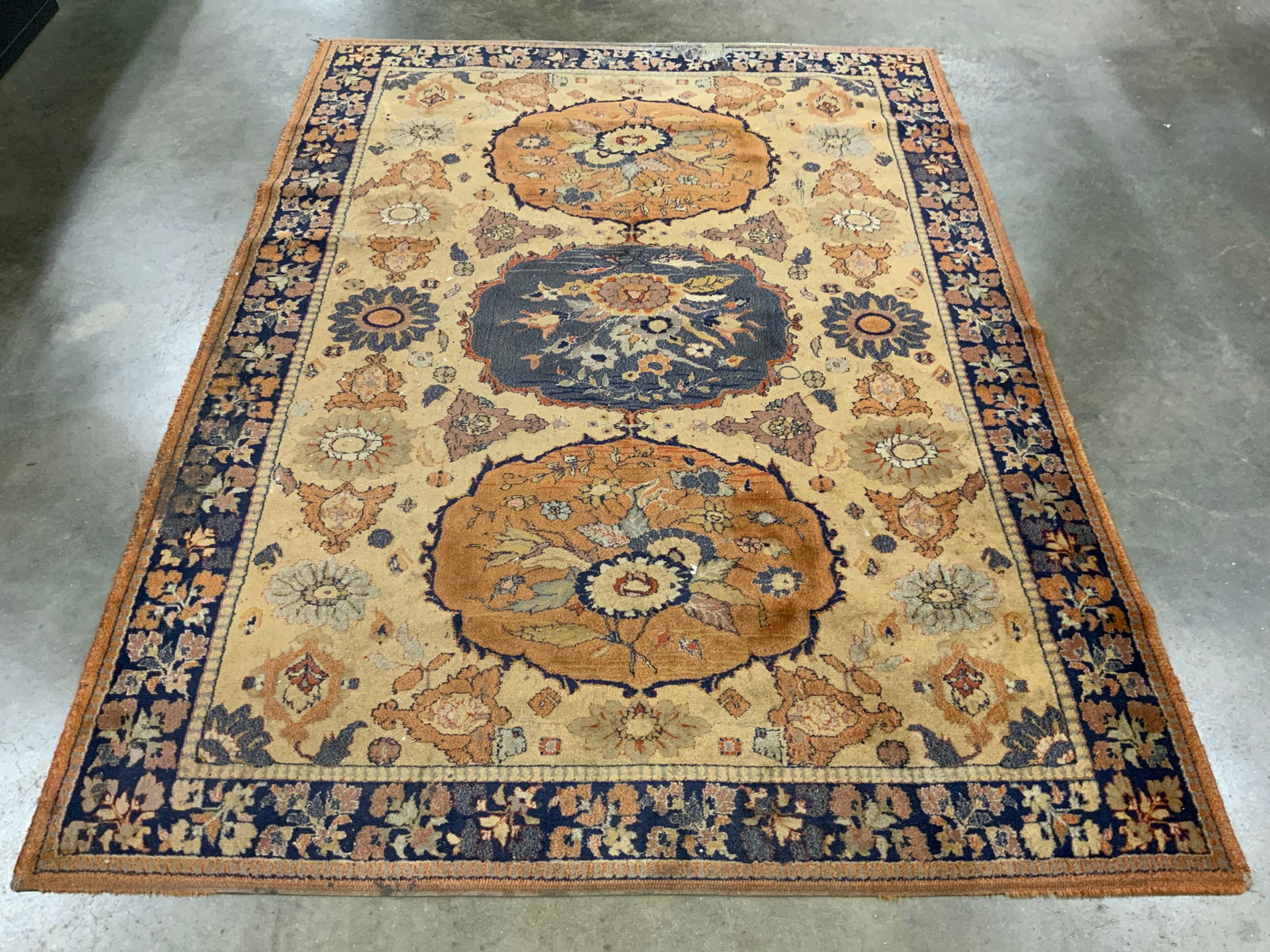 Vtg Handmade Persian Wool Area Rug: Rug appears to be handmade and wool. Persian rug with intricate multi toned floral motif detail. Edges of rug are fringe less . Rug is room sized. Measures approximately 91 inches long 67 inches wide.
