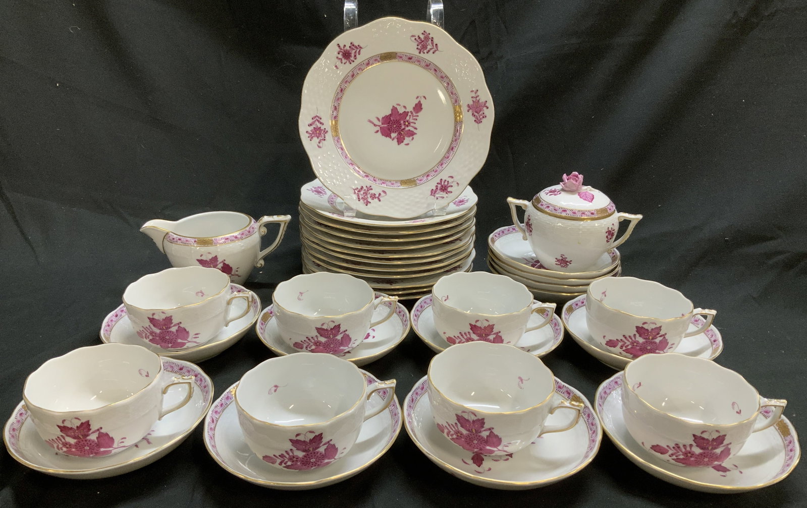 Set34 Herend Chinese Bouquet Tableware HUNGARY: Lot includes, 1 creamer, 1 lidded sugar bowl, 8 teacups, 12 saucers & 12 salad plates. Pieces are porcelain & feature a pattern of central clusters of vibrant purple flowers and foliage. Rim of pieces