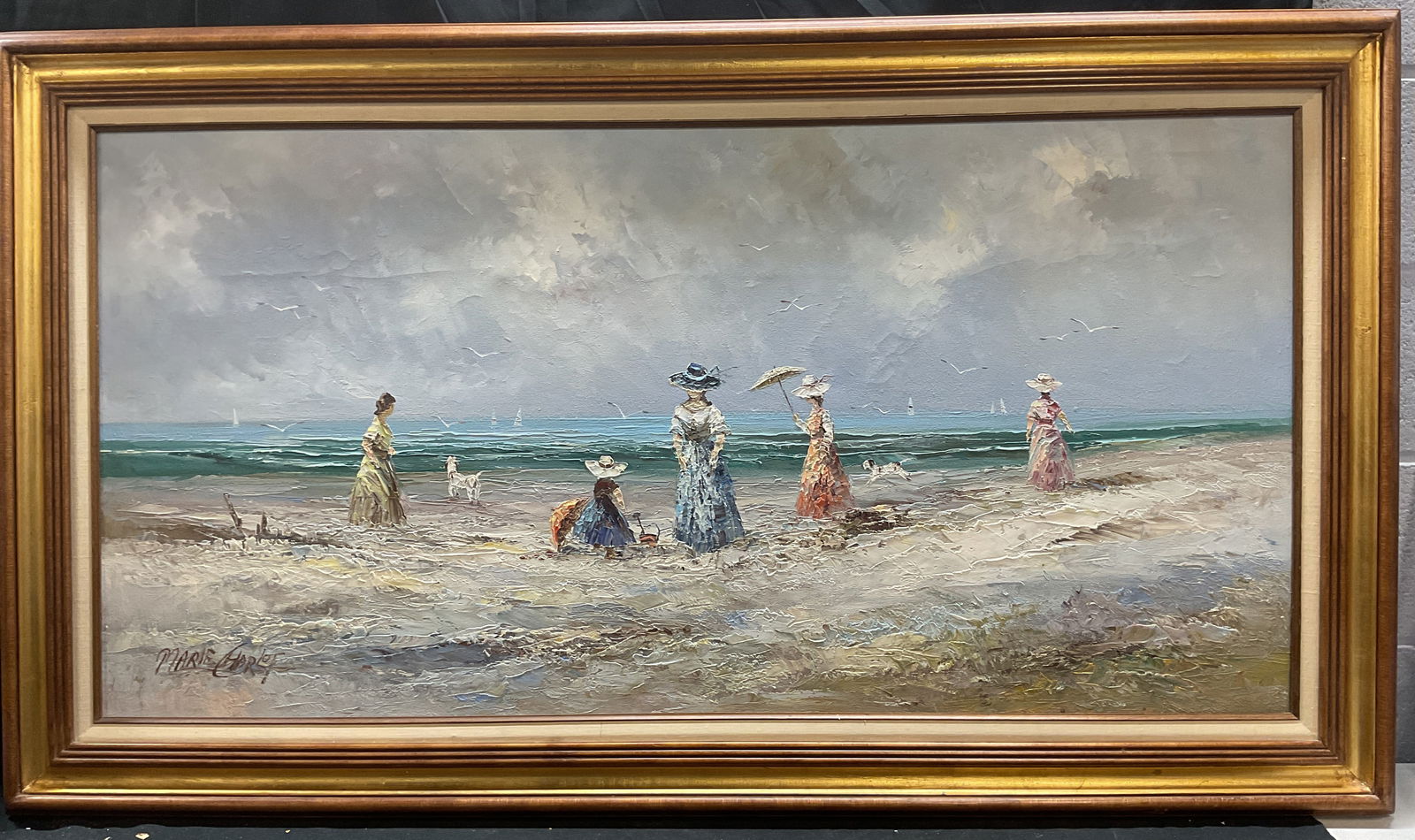 Signed Marie Charlot Beach Oil Painting 55 In W: Framed oil on canvas painting. Signed lower left, Marie Charlot. Beach scene with view of women and dog. Gilt wood frame. Not examined out of frame. Frame measures approx 31 x 55 inches. Some wear con