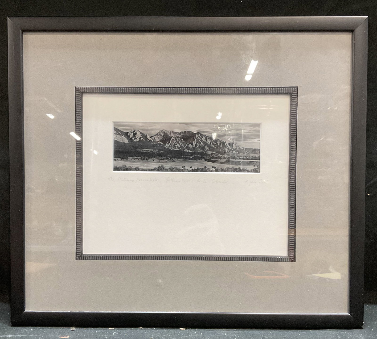 Framed Flatirons Formation Colorado Photograph: Framed and matted black and white photograph. Landscape. The Flatirons Formation, Southern View, Boulder, Colorado. Inscribed in graphite on mat, signed illegibly. Possibly Ryan Evans. Black wood fram
