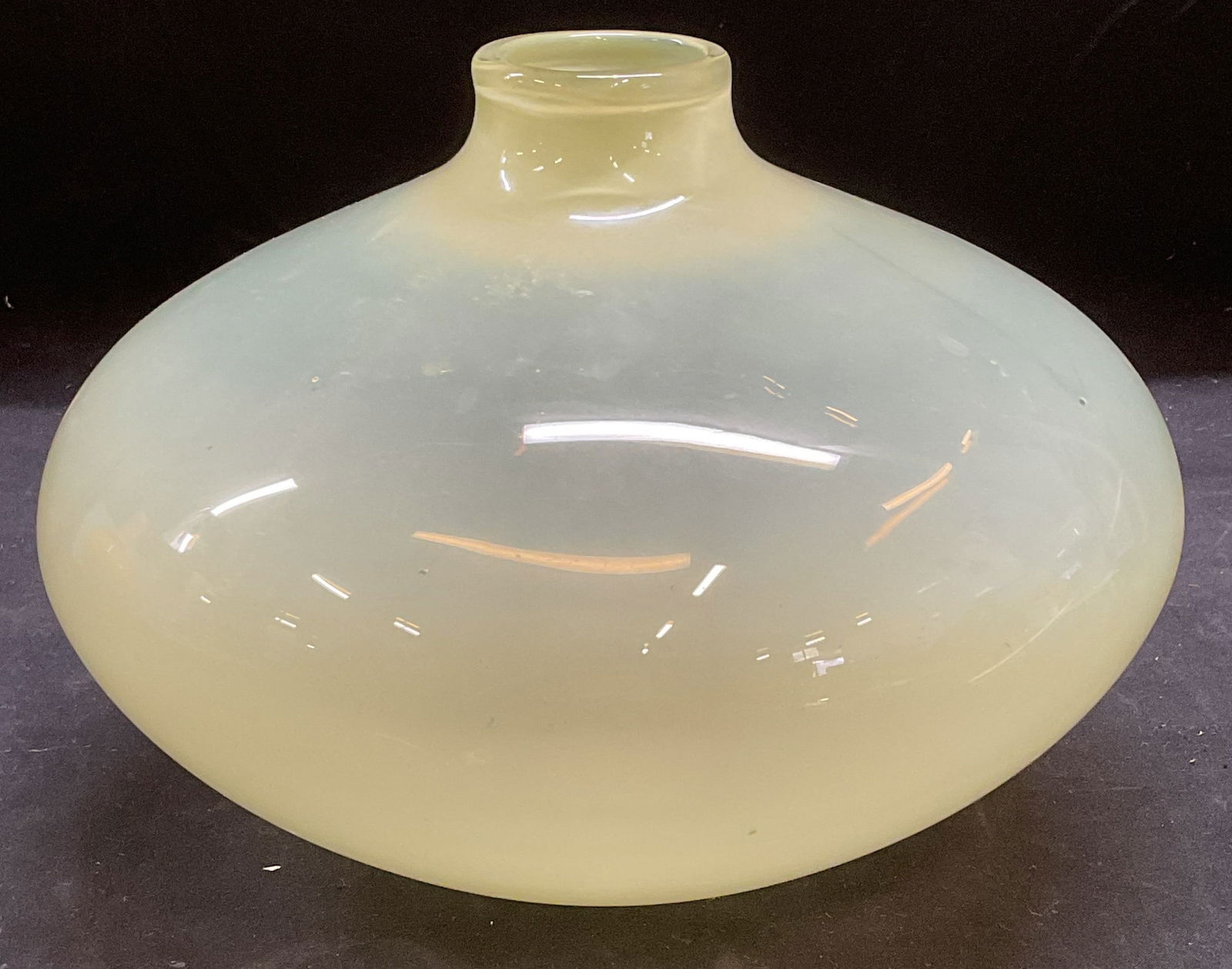 MCM Yellow Opaline Art Glass Vase: Mid century modern style hand blown yellow Opaline glass vase. Wide bulb shape with short straight neck. Thick walled glass, piece has weight. Measures approx 8 x 6 inches. Some scratches on underside