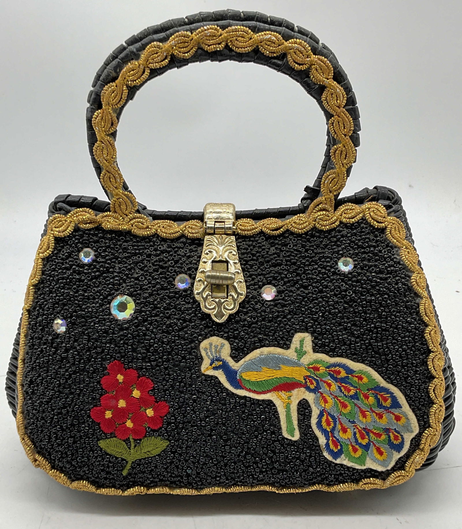 Vtg Narber Originals Beaded Embroidered Handbag: Vintage Narber Originals handbag. Black with gold tone metallic thread trim, embroidered flower and peacock, lucite crystal, and black beaded panel on front. Black woven outer. Faux leather lining. Si