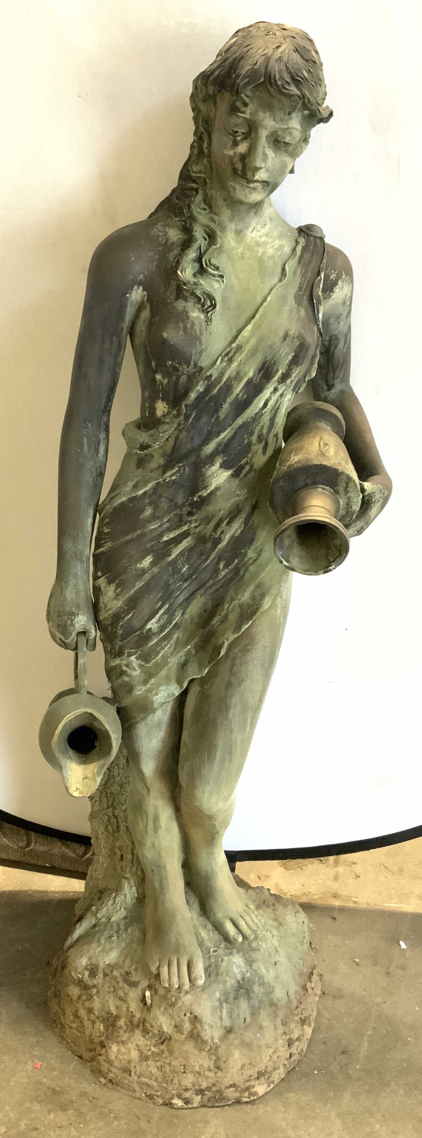 Patina Brass Female Figure Garden Fountain 68in: Female figure fountain is vintage. Piece appears to be patina brass. Depicts a barefoot partial female nude figure holding 2 vases. Spouts appear to be inside vase structures. Measures approximately 6