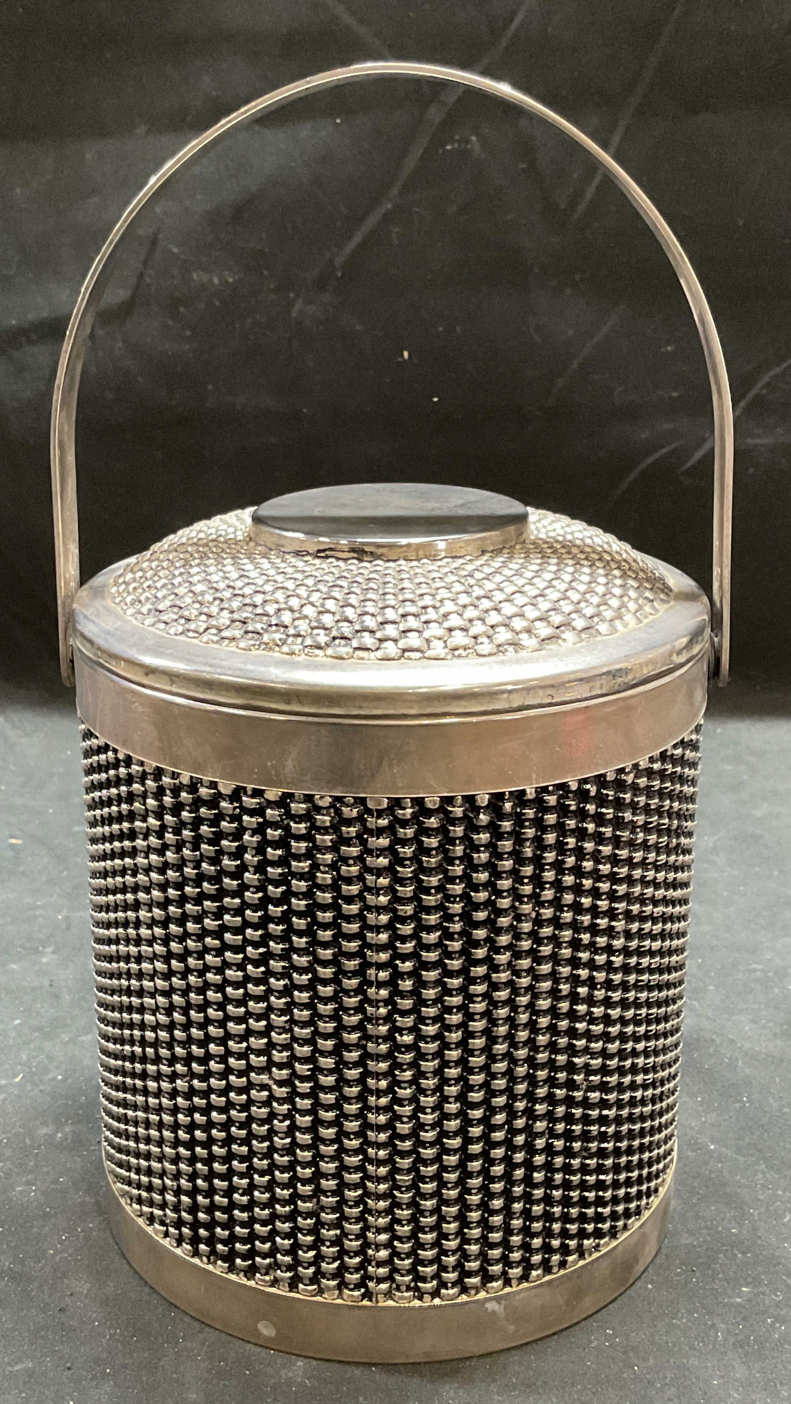 Vtg MCM Silver Plated Mesh Weave Ice Bucket: Vintage mid century modern style silver plated ice bucket. Woven mesh design outer. Measures approx 5.5 x 6.75 inches. Some scratching and patina. Property of historic Barstow Pell Mansion Museum in P