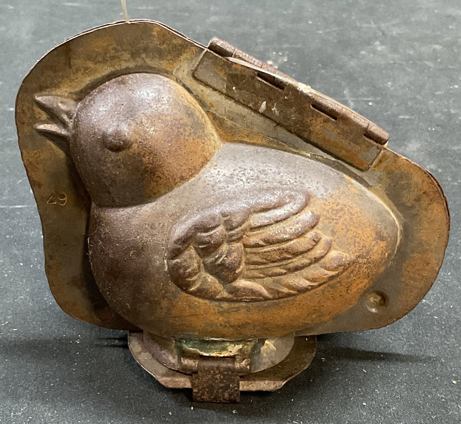 Vintage Wigly Brand Metal Bird Chocolate Mold: Vintage Wigly Brand cast metal bird motif chocolate mold. Signed. Measures approx 4.5 x 2 x 4 inches. Wear including scratching and patina. Wigly brand chocolate mold, chocolate mold, Vintage chocolat