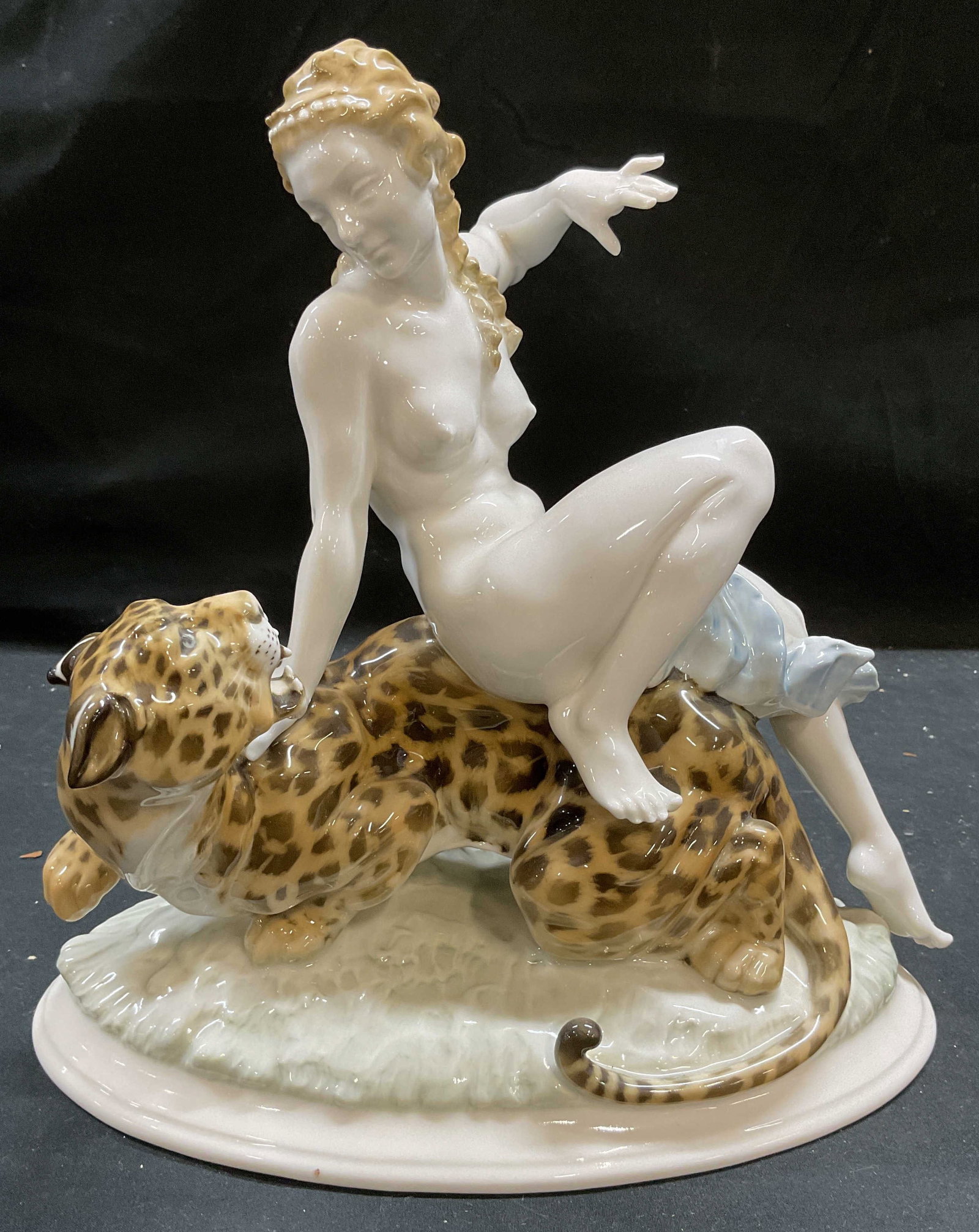 HUTSCHENREUTHER Tutter Porcelain Ariadne Fig: Vintage HUTSCHENREUTHER porcelain figurine. Designer by Karl Tutter. Signed K Tutter on bae. Backstamp on underside. Made in Germany. Ariadne and the Leopard. Nude female figure seated on leopard. Han
