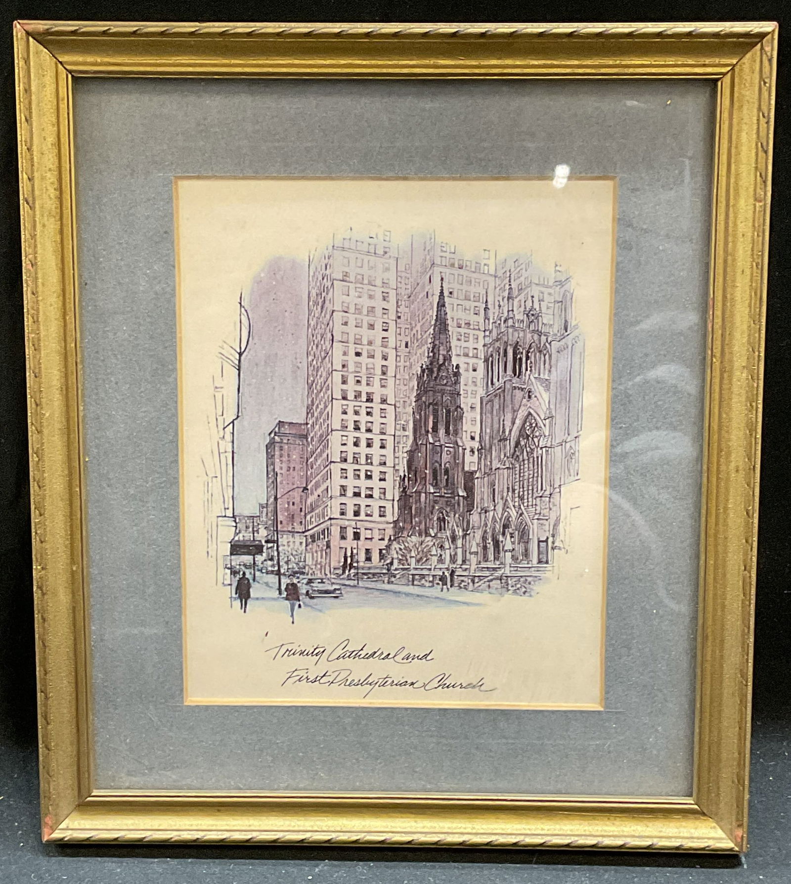 Framed Trinity Cathedral NYC Lithograph: Framed and matted lithograph on paper. Trinity Cathedral and First Presbyterian Church. New York City scene. Personal inscriptions on versos. Gilt wood frame. Not examined out of frame. Frame measures