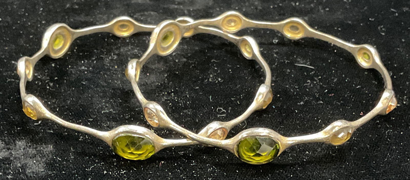 Pr Signed FAS Sterling Silver Semiprecious Bangles: Signed FAS sterling silver bangle bracelet with multicolor faceted semiprecious stones. Marked sterling. Measure approx 2.5 inches wide. Total weight 21.7 grams. Some wear including scratching. Jewelr