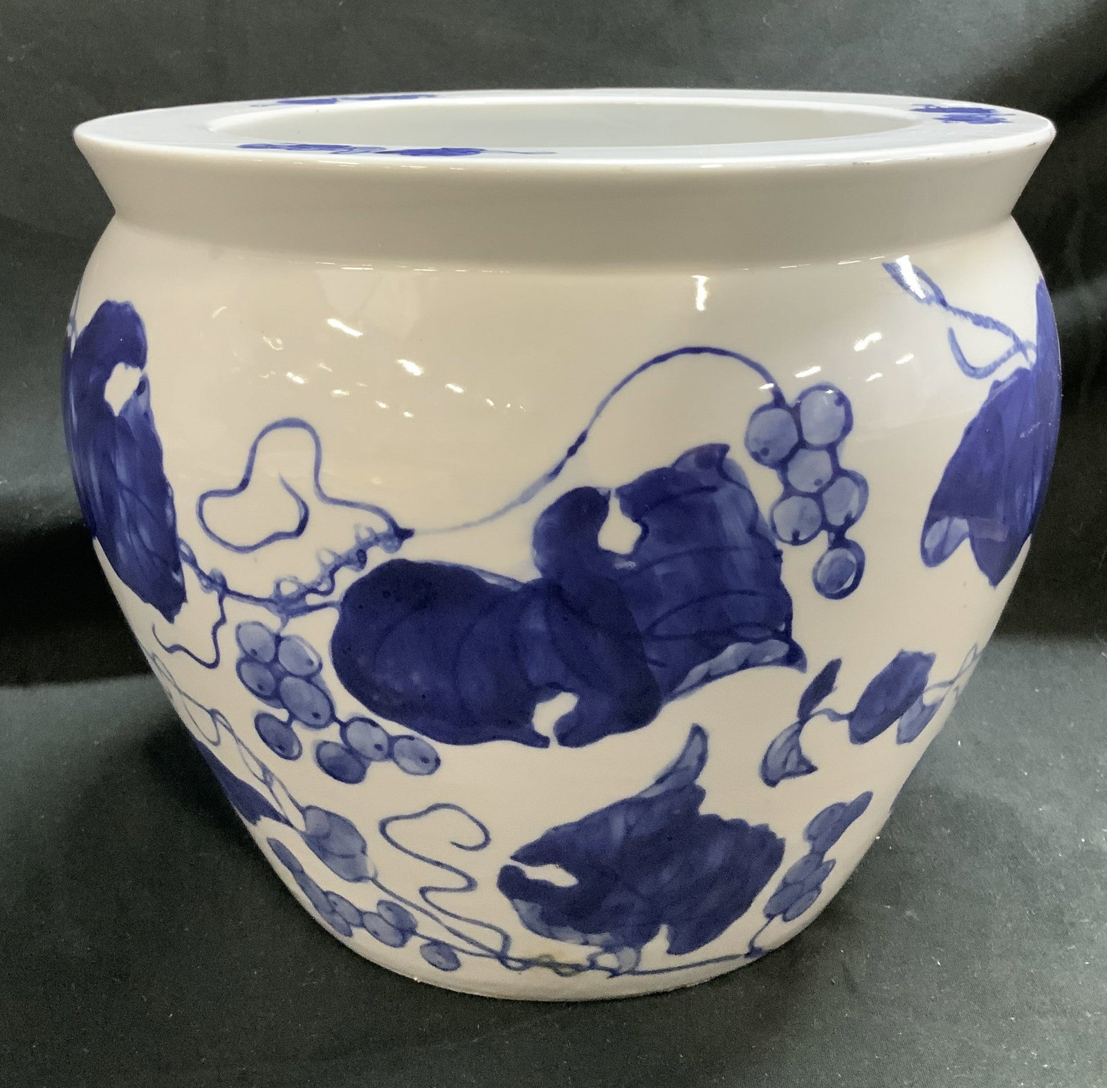 Craft Art International Fruit Motif Porc Planter: Craft Art International Fruit Motif Porc Planter Porcelain planter features intricate hand-painted blue & white fruit motif patterns. Signed & marked on underside. Reads, CRAFT ART INTERNATIONAL. Surf