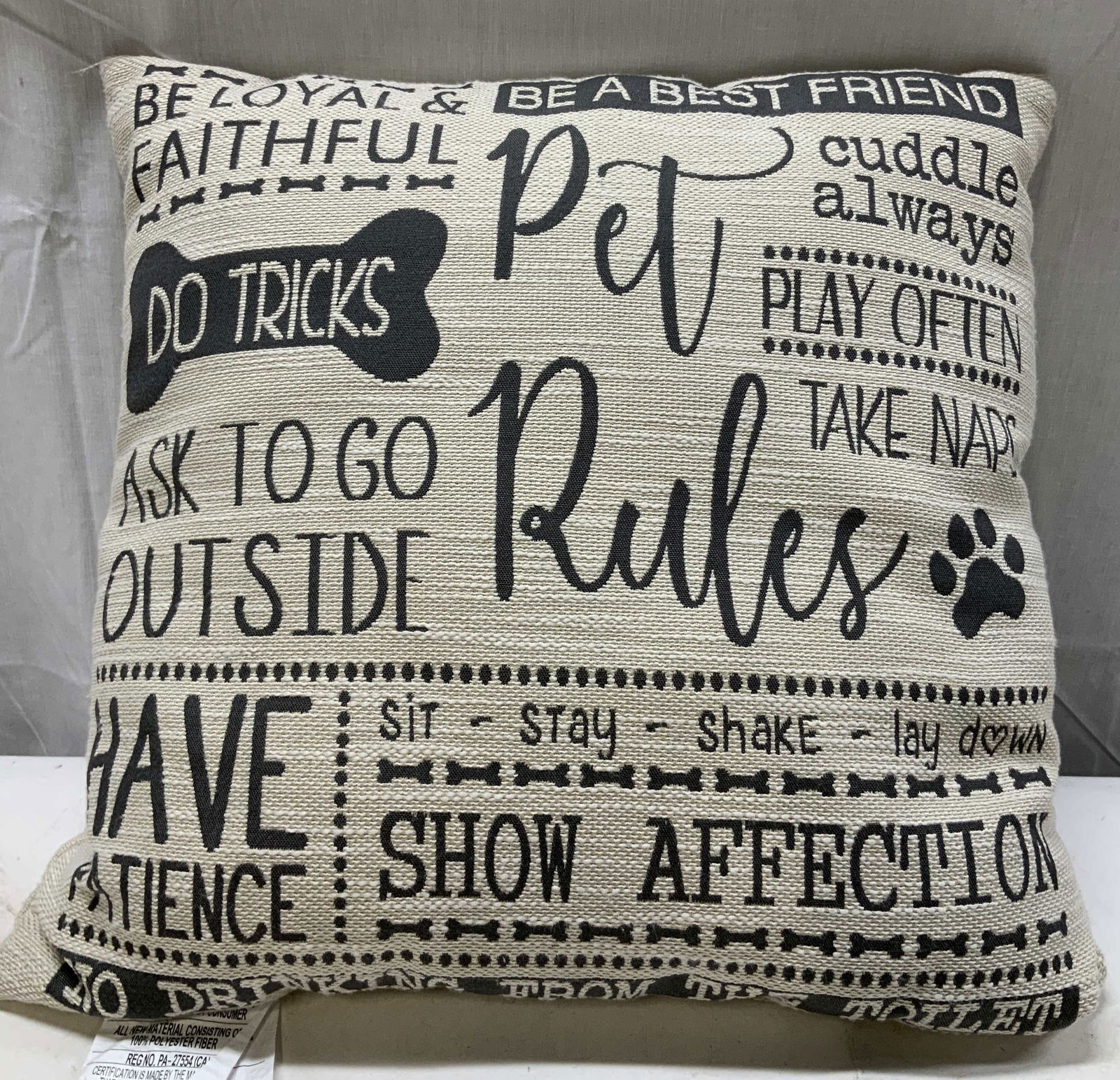 Pet Rules Cream Deco Throw Pillow: Pet Rules Cream Deco Throw Pillow Throw pillow has a cream color & features various grey lettering that reads, BE LOYAL & BE A BEST FRIEND, DO TRICKS, PLAY OFTEN, TAKE NAPS & more. Surface wear consis