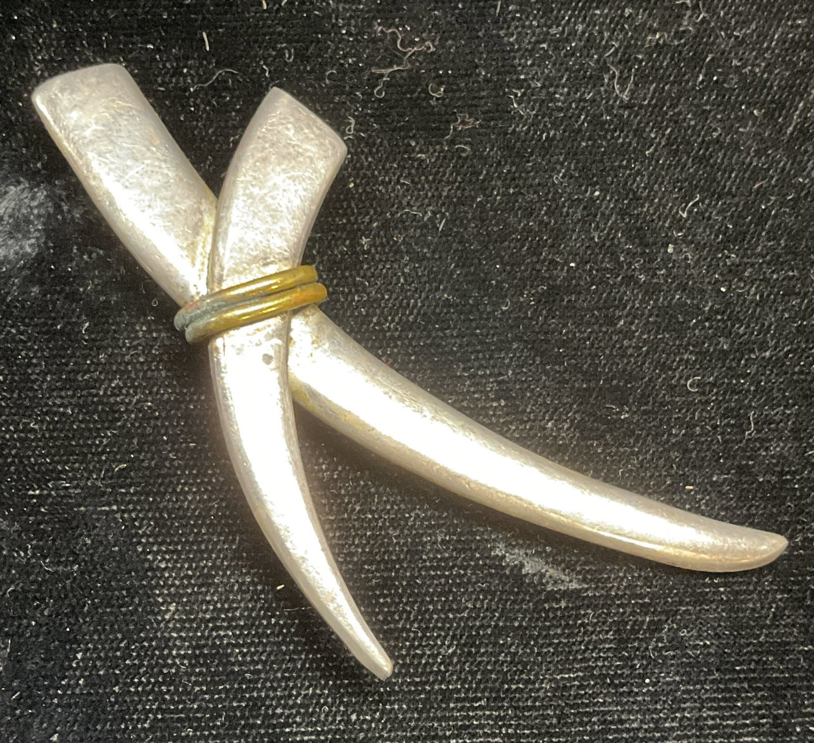 Vintage Sterling Silver Brass Brooch, Mexico: Vintage sterling silver and brass crossed lines brooch. Marked sterling. Made in Mexico. Measures approx 3 x 1.5 inches. Total weight 16,7 grams. Some wear including scratching. Jewelry, estate jewelr