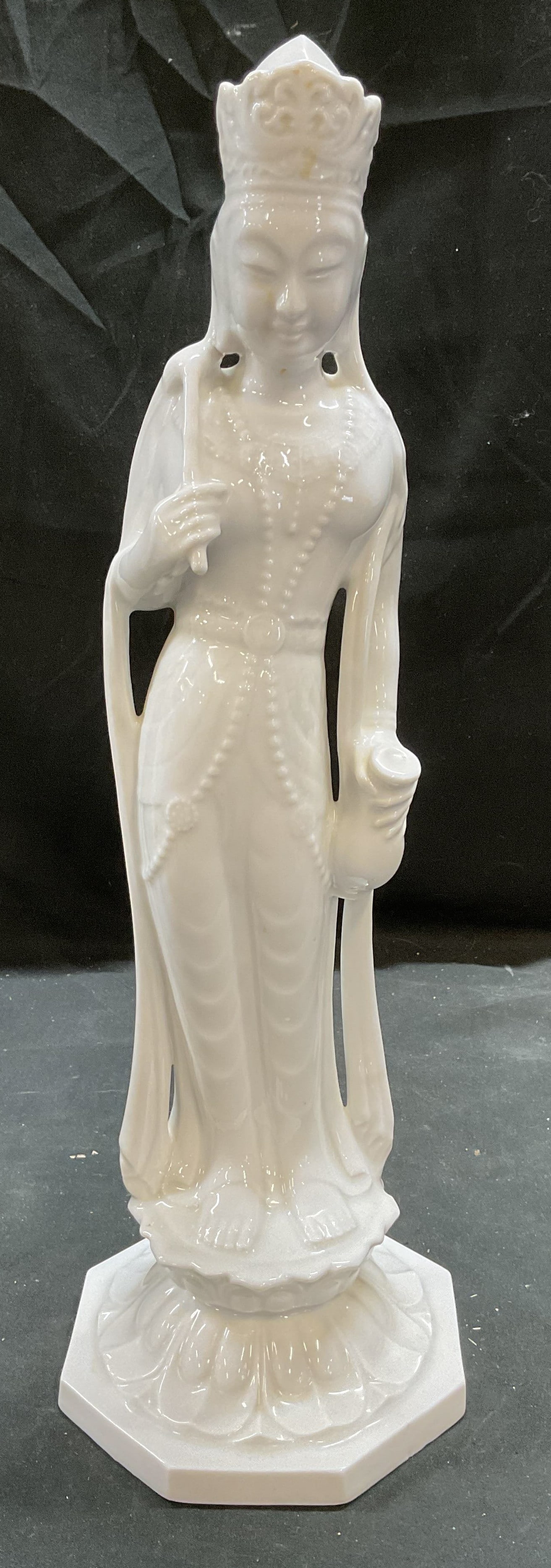 Asian Porcelain Guanyin Fig Statue 17 In T: Asian porcelain figurine statue depicting Guanyin. Measures approx 5.25 x 17 inches. Hairline crack observed. Guanyin statue, porcelain statue, Asian statue, Quan yin, kannon, collectibles, decorative