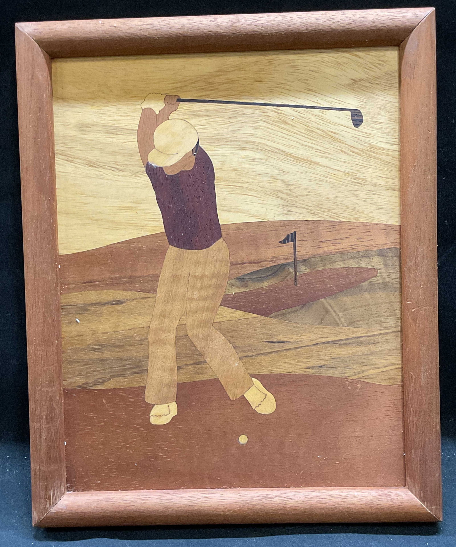 Framed Golfer Inlaid Wood Panel: Framed inlaid wood panel. Golf scene. Man swinging golf club. Wood framed. Not examined out of frame. Frame measures approx 10.75 x 8.75 inches. Some scratching. Art, framed art, home decor, home acce