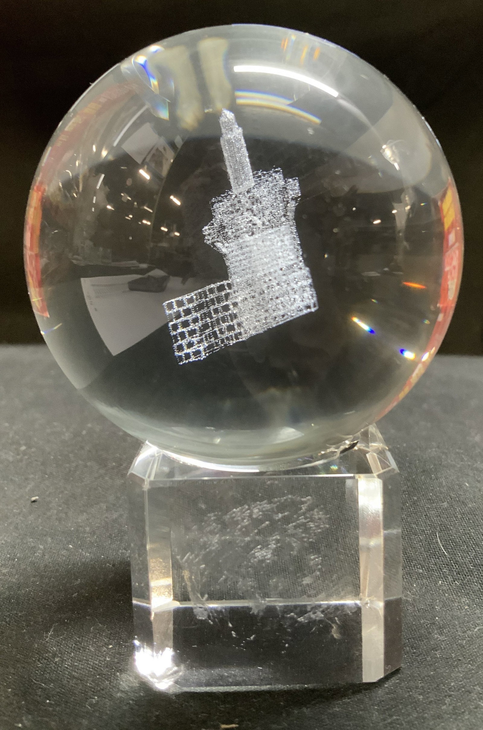 3D Laser Etched Crystal Sphere W Building Design: Clear crystal globe featuring a 3d laser etched building design inside, displayed on a faceted glass pedestal base. Surface wear consistent to age, use & exposure. Measurements: length 2.2in x width 2