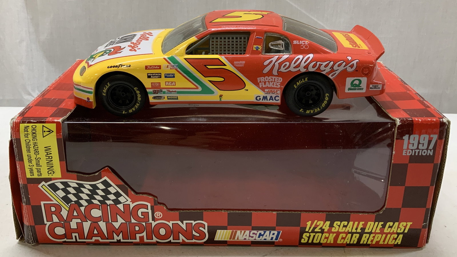 1997 NASCAR Labonte #5 Kelloggs Die-Cast Metal Car: 1997 NASCAR Labonte #5 Kelloggs Die-Cast Metal Car 1997 Racing Champions 1:24 die-cast metal replica of Terry Labontes #5 Kelloggs NASCAR car. Car features the Kelloggs logo on the hood & various spon