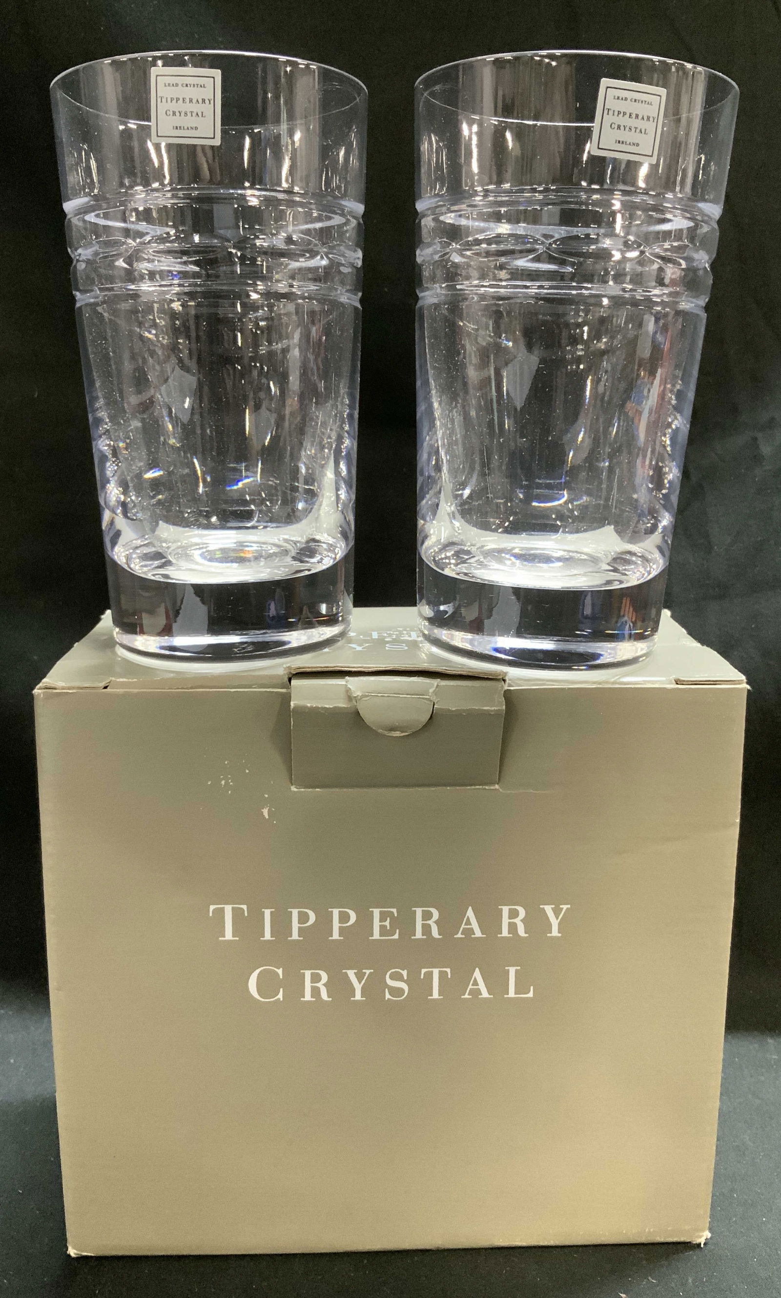 Pr Tipperary Crystal Glass Hiball Tumblers IRELAND: Lot includes, 2 glass highball tumblers. Tumblers are made of lead crystal material & feature a modern spiral design. Comes with original box. Box reads, TIPPERARY CRYSTAL. Surface wear consistent to