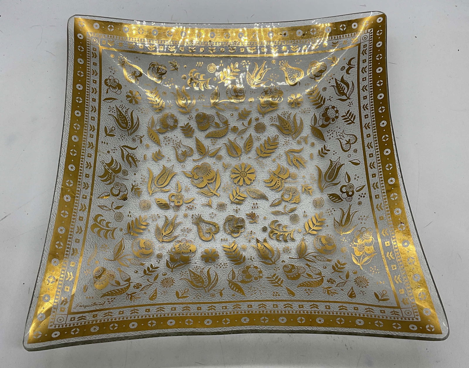 Georges BRIARD Gilt Textured Glass Square Bowl: Georges BRIARD textured gilt glass bowl with floral pattern Signed lower left corner. Measures approx 11.5 x 11.5 x 2 inches. Some scratching. Georges BRIARD, Georges BRIARD bowl, gilt bowl, glass bow
