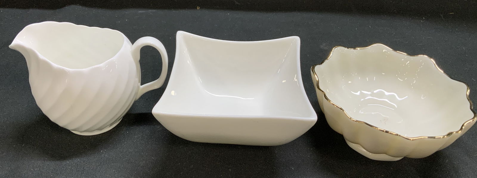 Lot 3 Creamer, Bonbon Dish & Sauce Bwl LENOX+: Lot includes, 1 ADDERLEY creamer, 1 Lenox Symphony bonbon dish & 1 square sauce bowl. Pieces are bone china or porcelain material. Signed & marked on underside. Reads, ADDERLEY. FINE BONA CHINA ENGLAN