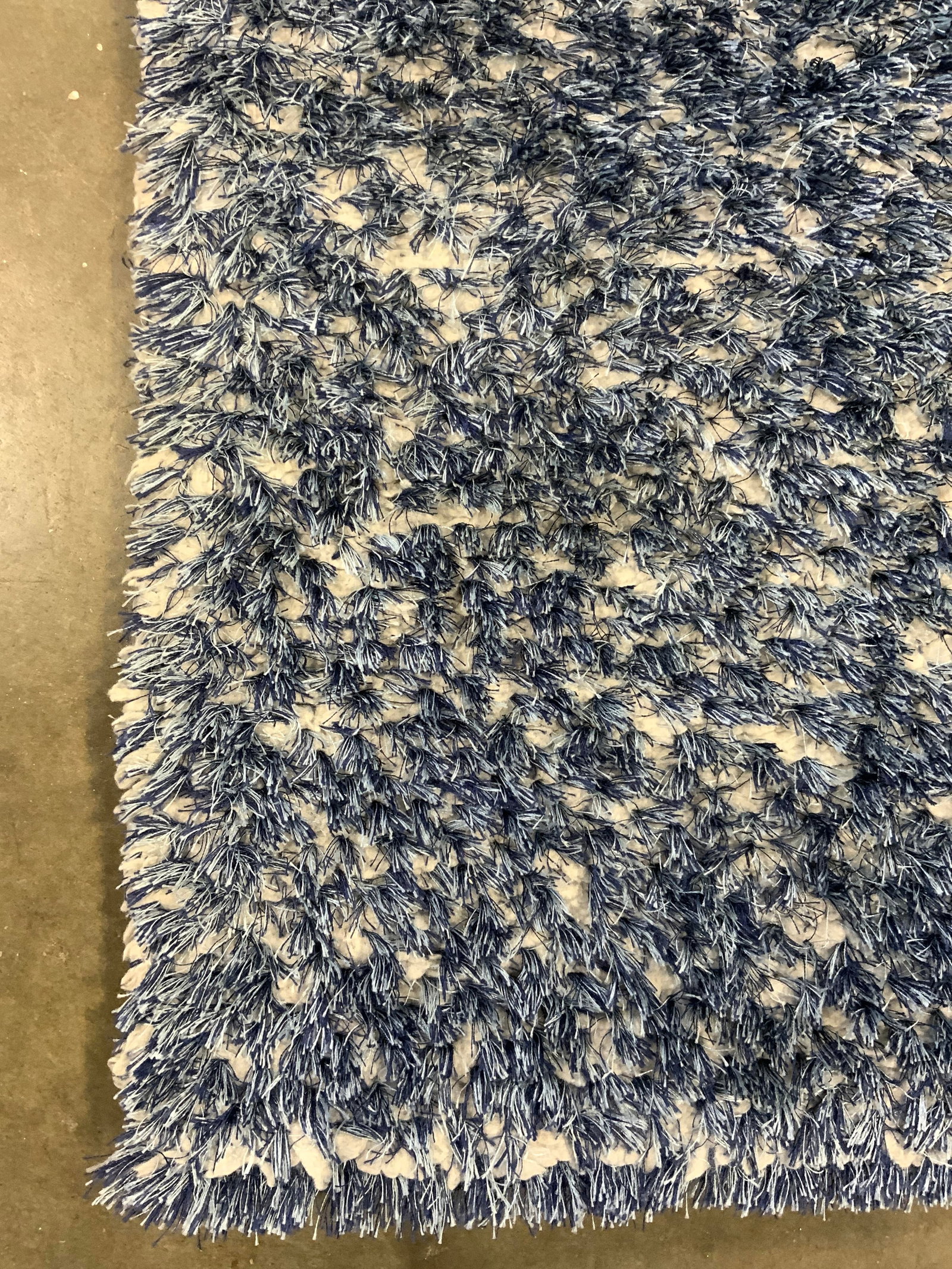 Country Willow Shag Carpet Area Rug Blue: Rug is shag. Piece has blue & white tones. Rug measures approximately 67 inches long 42 inches wide. Rug, carpet, Shag rug, shag carpet, area rug, blue rug, homewares, home decor. Property of Country 