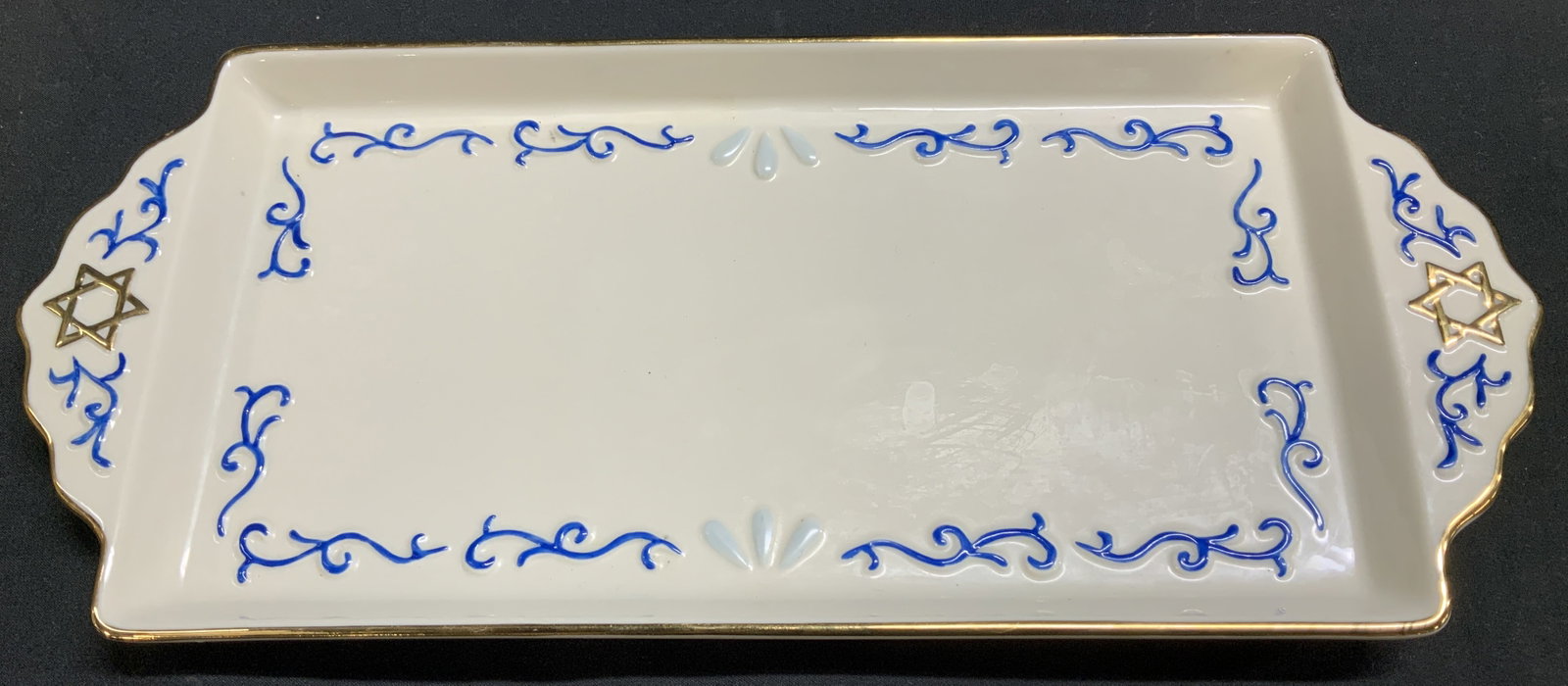 MIKASA Jewish Challah Porcelain Serving Platter: Rectangular challah serving platter used during Shabbat & other Jewish holidays. Platter has a gold trim & embossed blue scrollwork w a Star of David at each end. Signed & marked on underside. Reads, 
