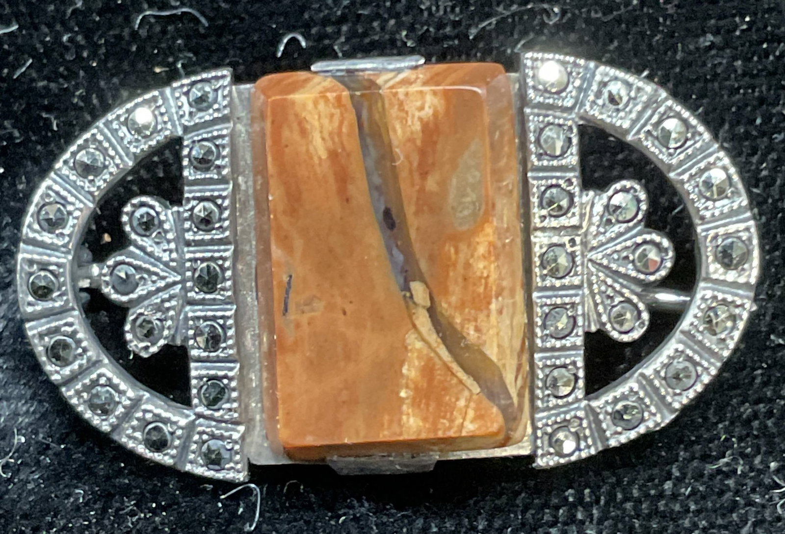 Vtg Silver Marcasite Semiprecious Brooch: Vintage art deco style silver brooch with marcasite and brown semiprecious stone. Tests for silver using acid test, purity unknown. Measures approx.75 x 1.25 inches. Total weight 4.8 grams. Some scrat