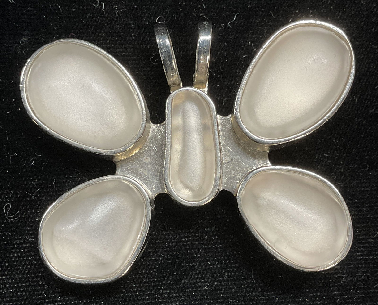 Rebecca Collins Lucite Butterfly Pendant Clip: Signed Rebecca Collins butterfly motif silver tone lucite cabochon pendant with clip backing. Measures approx 1.75 x 2.5 inches. Some scratching. Jewelry, estate jewelry, costume jewelry, cocktail jew