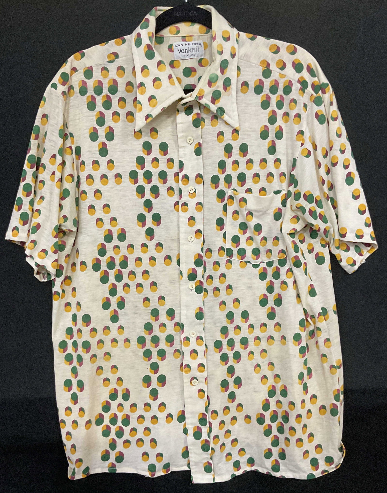Vintage Van Heusen Print Button Up Shirt: Vintage Van Heusen white multicolor geometric Graphic print button up shirt. Collared. Short sleeves. Size xl. Synthetic material. Some blemishes and holes. Van Heusen shirt, designer shirt, Vintage s