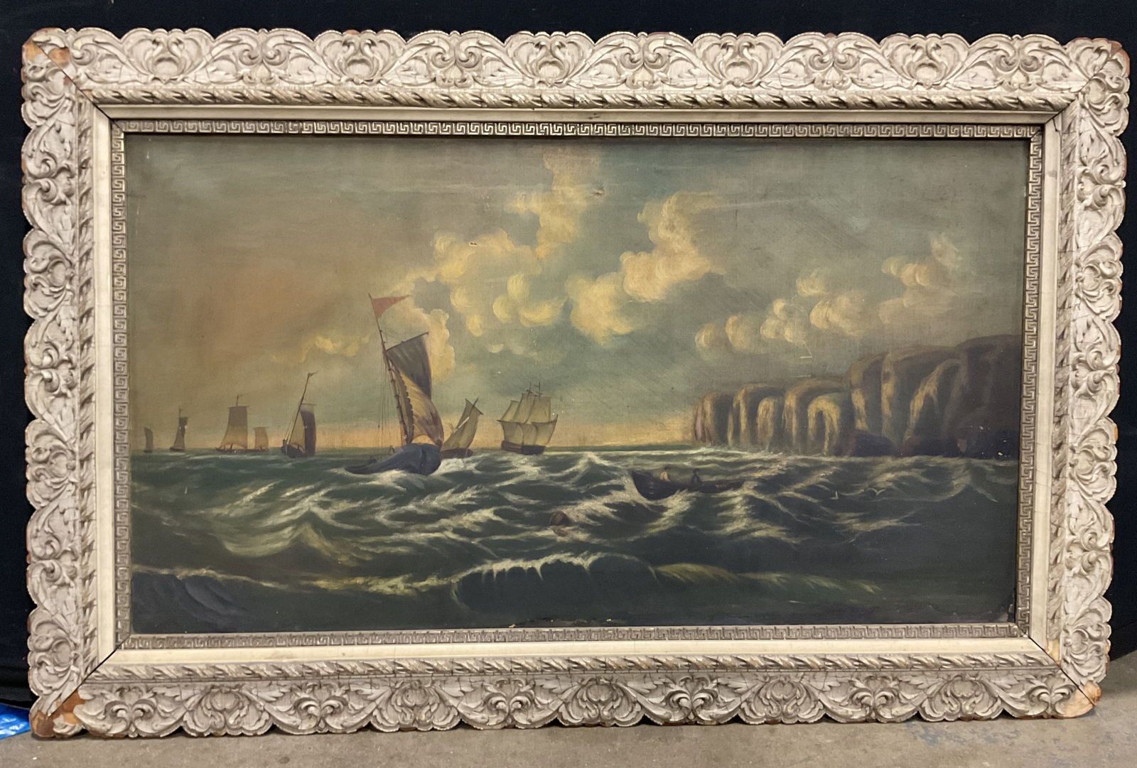 Antique Framed Sainting Sailing Oil Painting: Antique framed oil on canvas painting. Ships sailing on water. Decorative wood and gesso frame. Not examined out of frame. Frame measures approx 27.5 x 43.5 inches. Wear including losses to frame, som