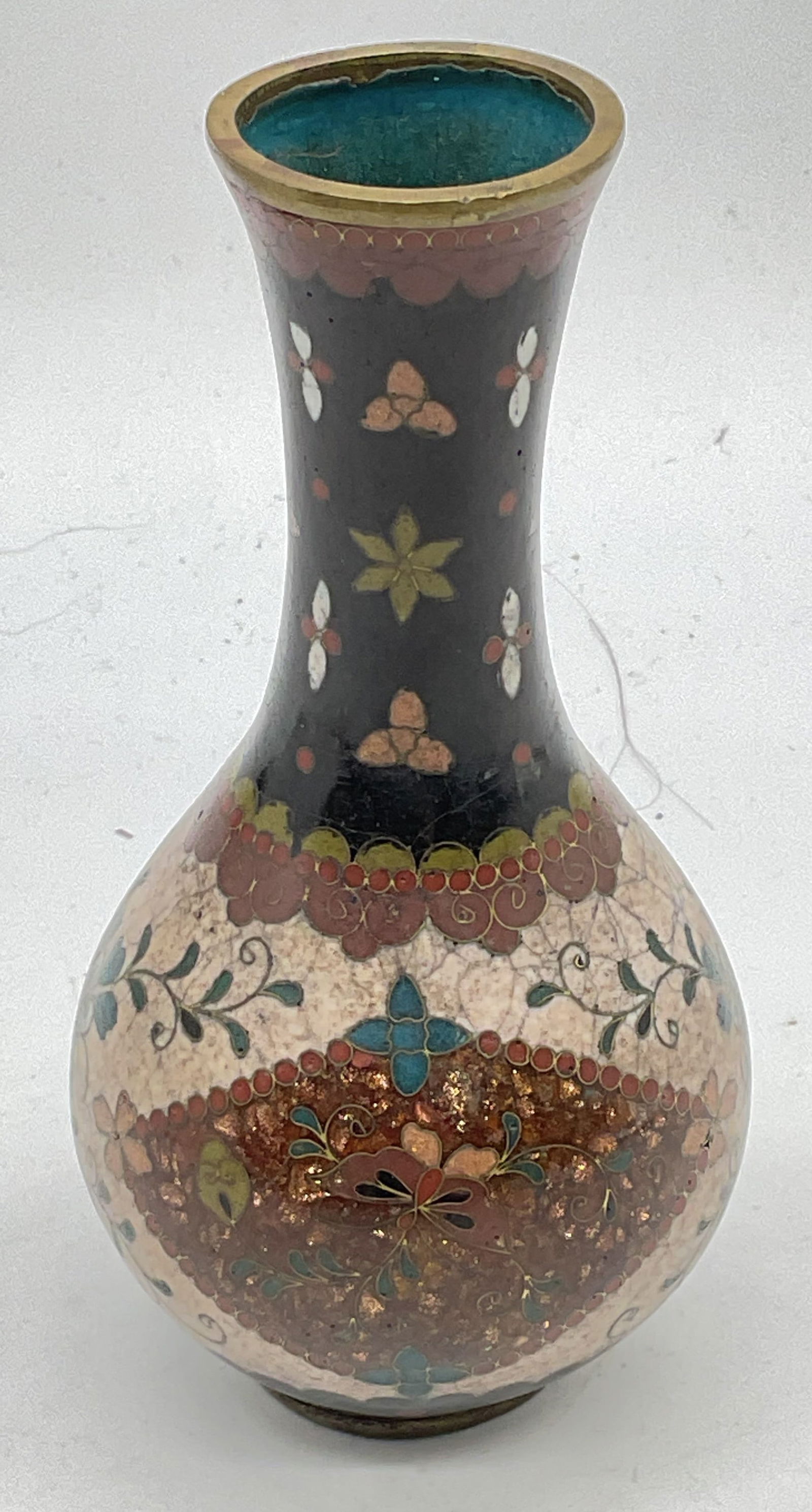 Vintage Asian Cloisonne Butterfly Vase: Vintage Asian cloisonne vase. Enamel over brass. Cartouches of butterflies and ornate floral borders. Hand painted. Measures approx 2.5 x 5 inches. Some crazing and scratching. Cloisonne vase, Asian v